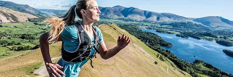 Woman Running In Mountains Nikwax 768px